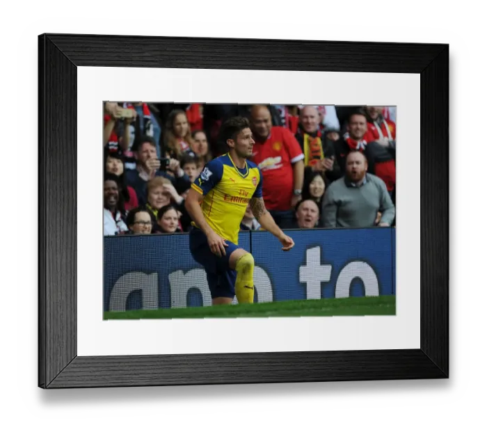Framed Print : Arsenal's Olivier Giroud Goes Head-to-Head with Manchester United in Premier League Showdown (2014-15)