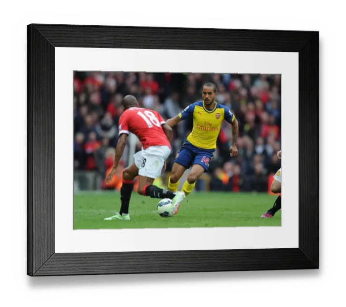 Framed Print : Theo Walcott vs Ashley Young: A Riveting Clash at Old Trafford - Manchester United vs Arsenal, Premier League 2014-15 Framed Print : Theo Walcott vs Ashley Young: A Riveting Clash at Old Trafford - Manchester United vs Arsenal, Premier League 2014-15