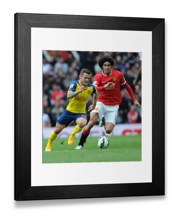 Framed Print : Wilshere Surges Past Fellaini: Manchester United vs. Arsenal, Premier League 2014-15 - Intense Rivalry on the Field Framed Print : Wilshere Surges Past Fellaini: Manchester United vs. Arsenal, Premier League 2014-15 - Intense Rivalry on the Field