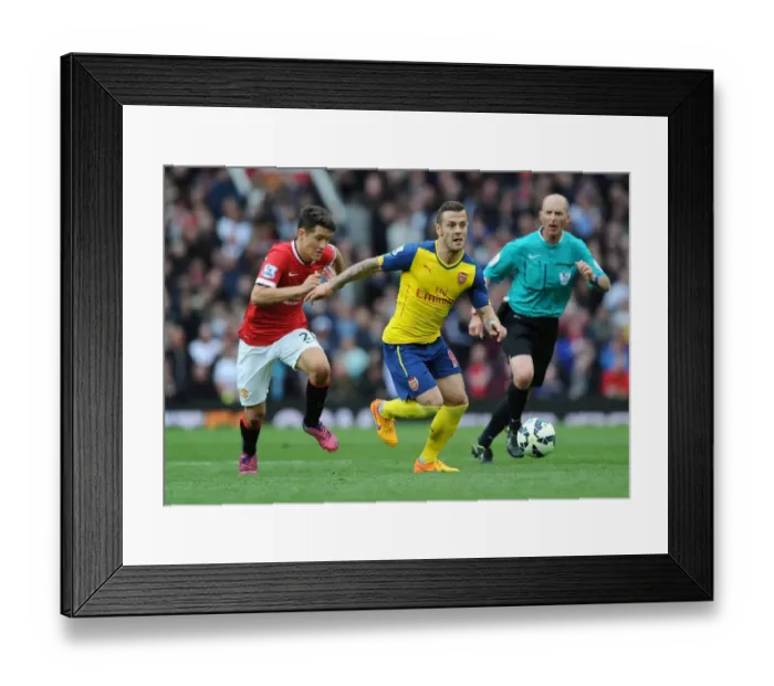 Framed Print : Jack Wilshere Outsmarts Ander Herrera: Intense Premier League Clash between Manchester United and Arsenal (2014-15) Framed Print : Jack Wilshere Outsmarts Ander Herrera: Intense Premier League Clash between Manchester United and Arsenal (2014-15)