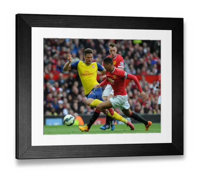 Framed Print : Olivier Giroud (Arsenal) Chris Smalling and Phil Jones (Man Utd). Manchester United 1: 1 Arsenal Framed Print : Olivier Giroud (Arsenal) Chris Smalling and Phil Jones (Man Utd). Manchester United 1: 1 Arsenal