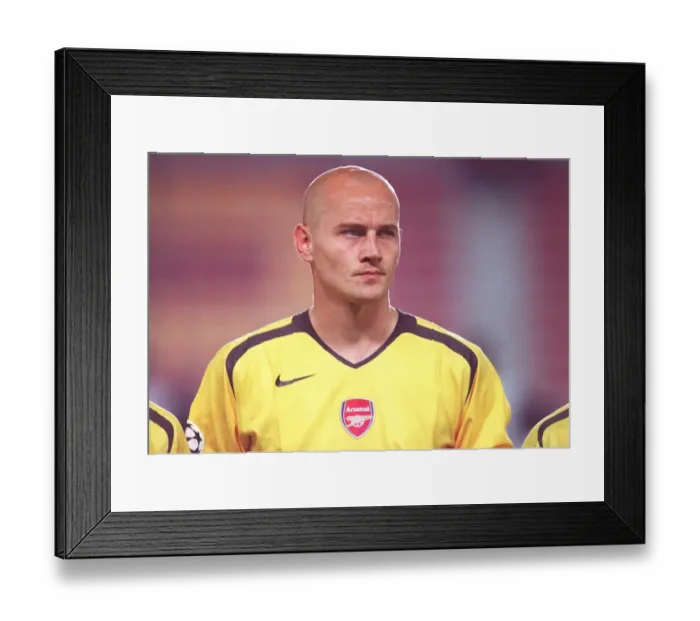 Framed Print : Arsenal's Cygan Leads the Way: 2-0 Victory Over Sparta Prague in Champions League Group B Framed Print : Arsenal's Cygan Leads the Way: 2-0 Victory Over Sparta Prague in Champions League Group B