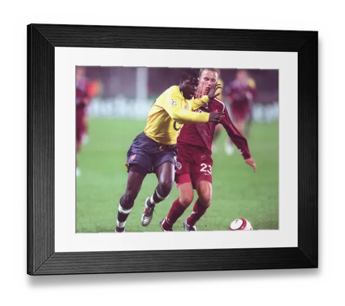 Framed Print : Eboue. Emmanuel Eboue (Arsenal). Michal Kadlec (Sparta Prague) Framed Print : Eboue. Emmanuel Eboue (Arsenal). Michal Kadlec (Sparta Prague)