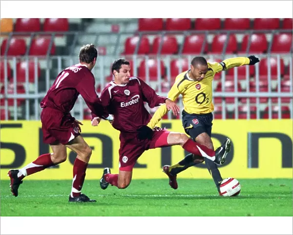 Henry. Thierry Henry (Arsenal) Petr Lukas and Adam Petrous (Arsenal) Sparta Prague 0