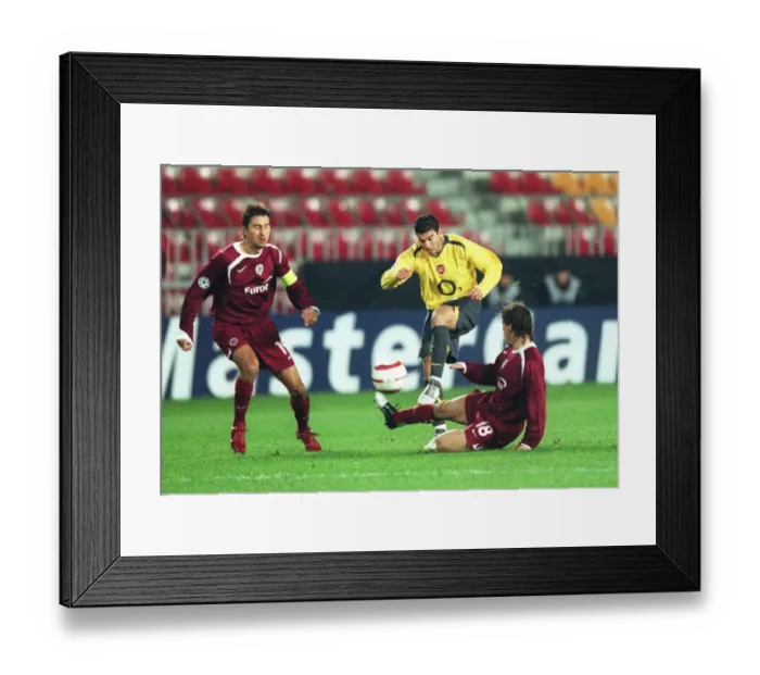 Framed Print : Reyes and Kisel Clash: Arsenal's Dominance Over Sparta Prague in Champions League Group B (18 / 10 / 2005) Framed Print : Reyes and Kisel Clash: Arsenal's Dominance Over Sparta Prague in Champions League Group B (18 / 10 / 2005)