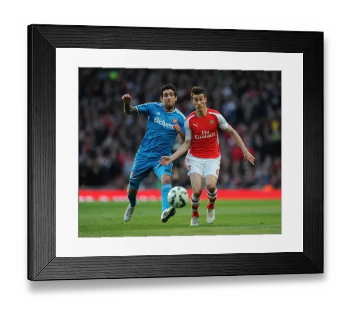 Framed Print : Koscielny vs. Graham: Intense Clash at Emirates - Arsenal vs. Sunderland, Premier League 2014-15