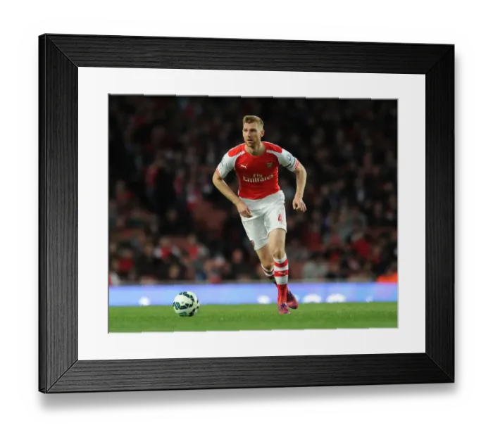 Framed Print : Per Mertesacker's Focus: Arsenal's Victory Against Sunderland (2015) Framed Print : Per Mertesacker's Focus: Arsenal's Victory Against Sunderland (2015)