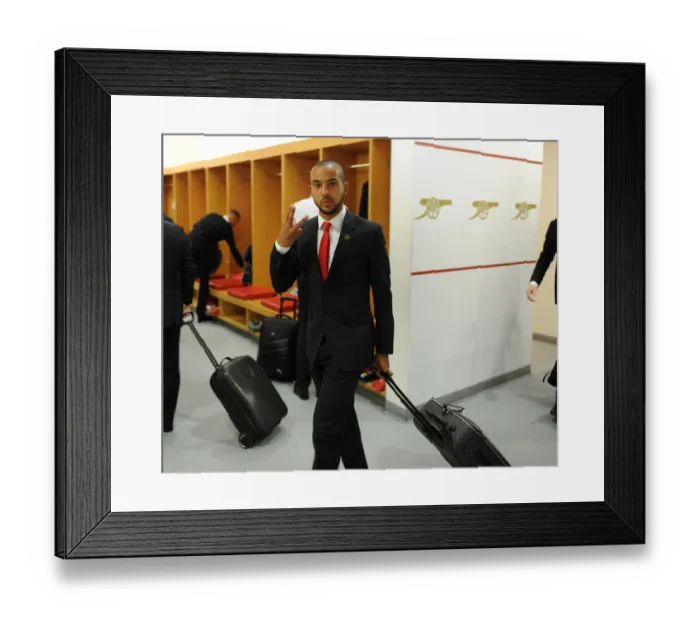 Framed Print : Theo Walcott's Pre-Match Routine: Arsenal Changing Room Before Arsenal vs Sunderland (2014-15)