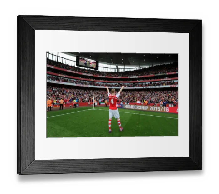 Framed Print : Arsenal's Victory Celebration: Per Mertesacker Salutes the Faithful (2014 / 15)