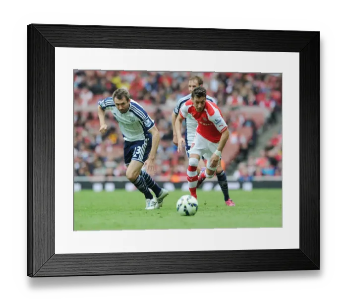 Framed Print : Mesut Ozil Outmaneuvers Gareth McAuley: Arsenal's Thrilling Victory over West Bromwich Albion, Premier League 2014 / 15