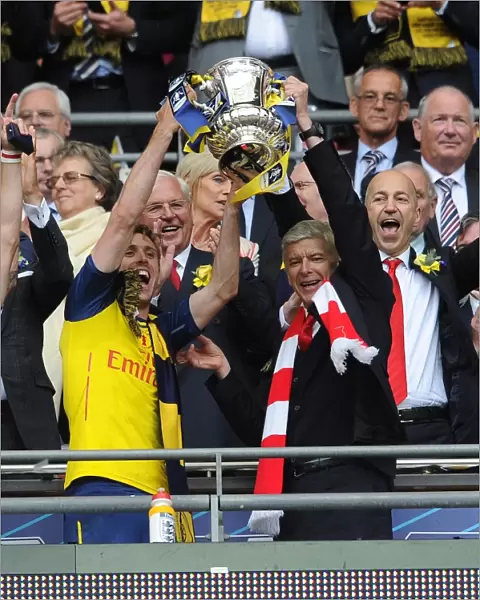 Arsenal's Glory: Monreal and Wenger Lift FA Cup After Arsenal's Victory over Aston Villa