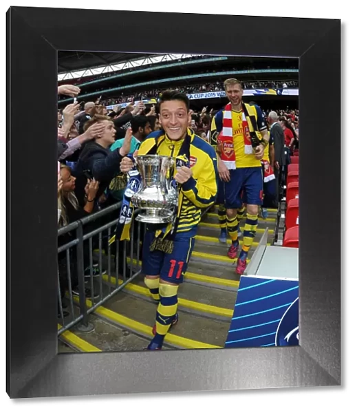 Arsenal's FA Cup Victory: Mesut Özil's Triumphant Moment at Wembley Stadium (2015)