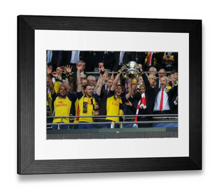 Framed Print : Arsenal's FA Cup Victory: Arsene Wenger and Nacho Monreal Celebrate with the Trophy (2015) Framed Print : Arsenal's FA Cup Victory: Arsene Wenger and Nacho Monreal Celebrate with the Trophy (2015)