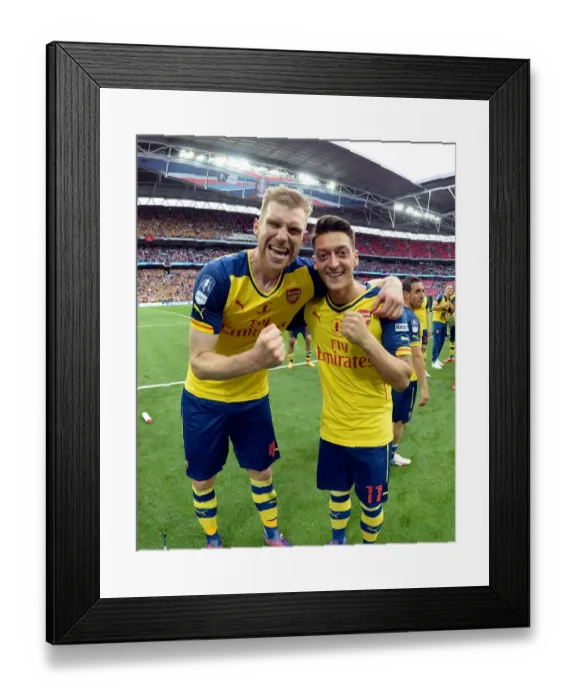 Framed Print : Arsenal FC: Per Mertesacker and Mesut Ozil Celebrate FA Cup Victory
