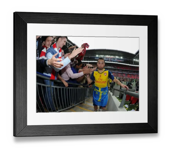 Framed Print : Santi Cazorla's Triumphant FA Cup Celebration: Arsenal's Victory over Aston Villa