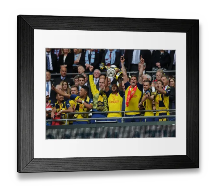 Framed Print : Arsenal FC's FA Cup Victory: Theo Walcott's Triumphant Moment Framed Print : Arsenal FC's FA Cup Victory: Theo Walcott's Triumphant Moment