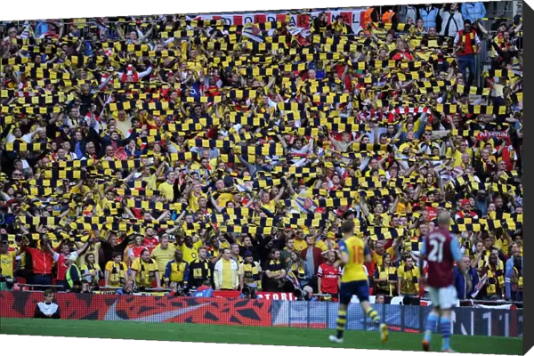 Arsenal fans hold up there scarves during the match. Arsenal 4: 0 Aston Villa. FA Cup Final