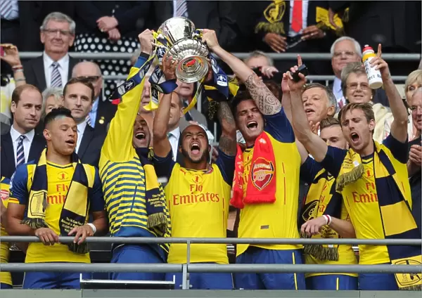David Ospina, Theo Walcott, Olivier Giroud and Nacho Monreal (Arsenal) lift the FA