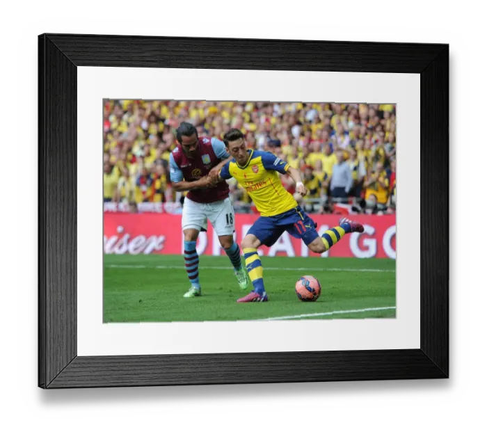 Framed Print : Arsenal's Ozil Leads FA Cup Victory Over Aston Villa (4-0)