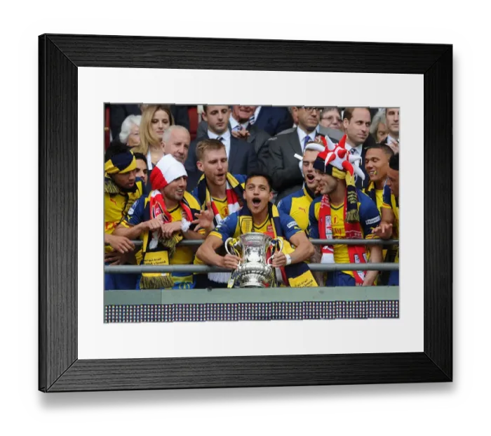Framed Print : Alexis Sanchez (Arsenal) lift the FA Cup after the match. Arsenal 4: 0 Aston Villa