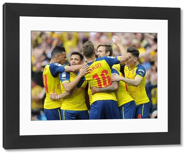 Theo Walcott celebrates scoring Arsenals 1st goal with his team mates. Arsenal 4: 0 Aston Villa