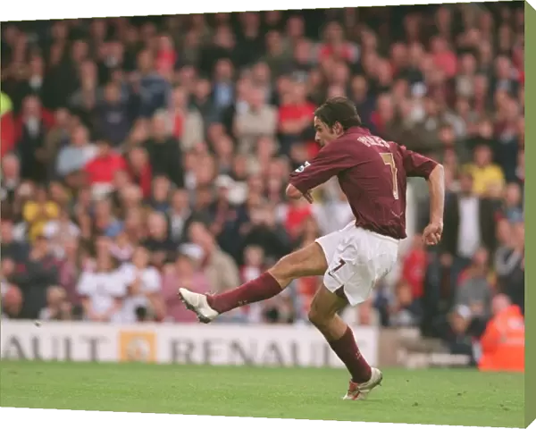 Robert Pires scores a goal for arsenal from the penalty from the penalty spot