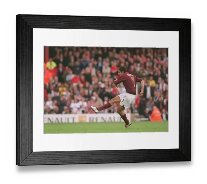 Framed Print : Robert Pires scores a goal for arsenal from the penalty from the penalty spot Framed Print : Robert Pires scores a goal for arsenal from the penalty from the penalty spot