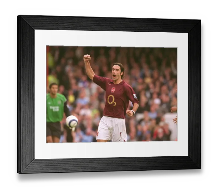 Framed Print : Robert Pires celebrates scoring Arsenals goal from the penalty spot