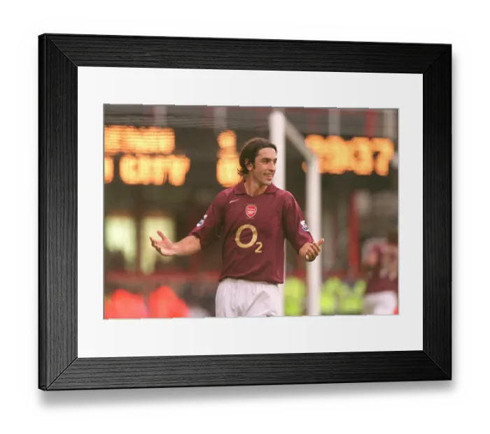 Framed Print : Robert Pires Thrilling Penalty Goal: Arsenal Leads Manchester City 1-0, FA Premier League, Highbury, London, 2005 Framed Print : Robert Pires Thrilling Penalty Goal: Arsenal Leads Manchester City 1-0, FA Premier League, Highbury, London, 2005