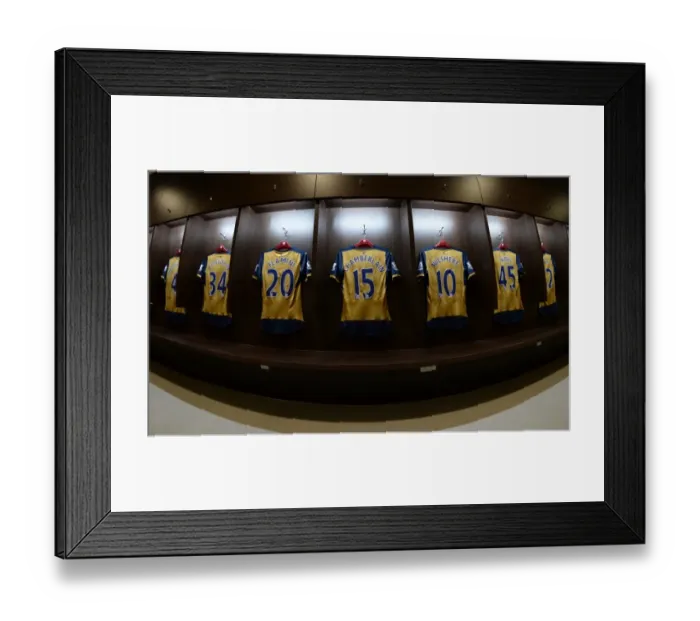 Framed Print : Arsenal kit in the changingroom before the match. Arsenal 4: 0 Singapore XI. Barclays