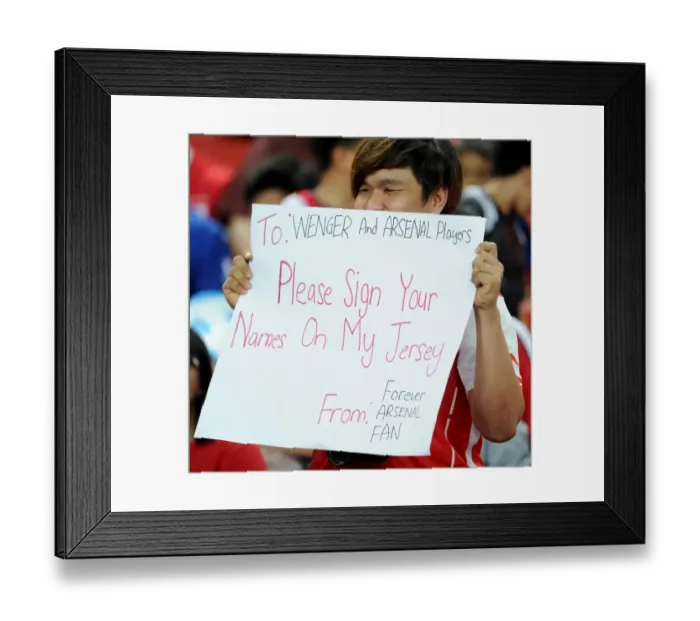 Framed Print : Arsenal fan. Arsenal 4: 0 Singapore XI. Barclays Asia Tour. Singapore, 15 / 7 / 15. Credit Framed Print : Arsenal fan. Arsenal 4: 0 Singapore XI. Barclays Asia Tour. Singapore, 15 / 7 / 15. Credit