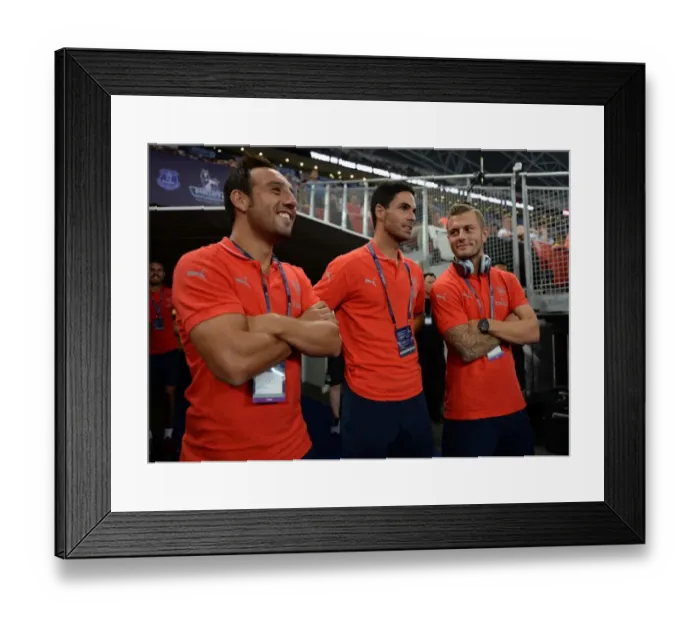 Framed Print : Arsenal's Triumvirate: Cazorla, Arteta, and Wilshere Before the Arsenal v Singapore XI Match Framed Print : Arsenal's Triumvirate: Cazorla, Arteta, and Wilshere Before the Arsenal v Singapore XI Match