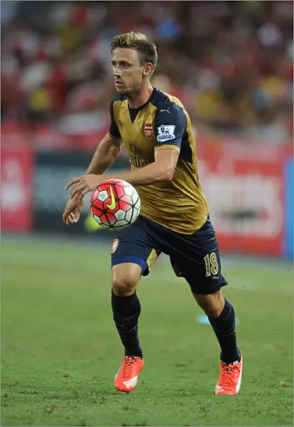 Nacho Monreal (Arsenal). Arsenal 4: 0 Singapore XI. Barclays Asia Trophy. Pre Season