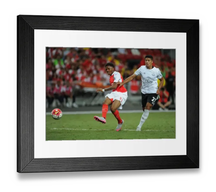 Framed Print : Arsenal's Chuba Akpom Battles Everton's Tyias Browning in Intense Asia Trophy Clash