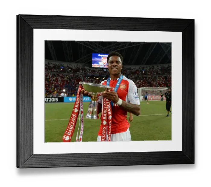 Framed Print : Arsenal's Chuba Akpom Lifts Barclays Asia Trophy after Arsenal's Victory over Everton Framed Print : Arsenal's Chuba Akpom Lifts Barclays Asia Trophy after Arsenal's Victory over Everton