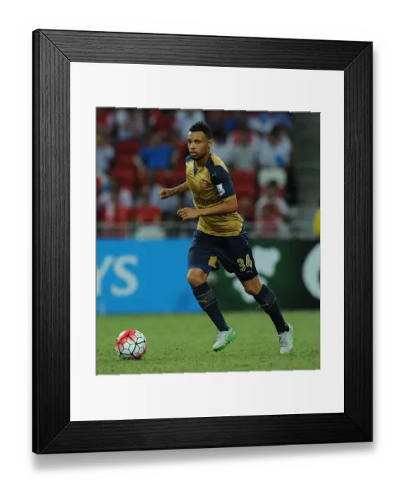 Framed Print : Arsenal's Francis Coquelin in Action against Singapore XI during the Barclays Asia Trophy
