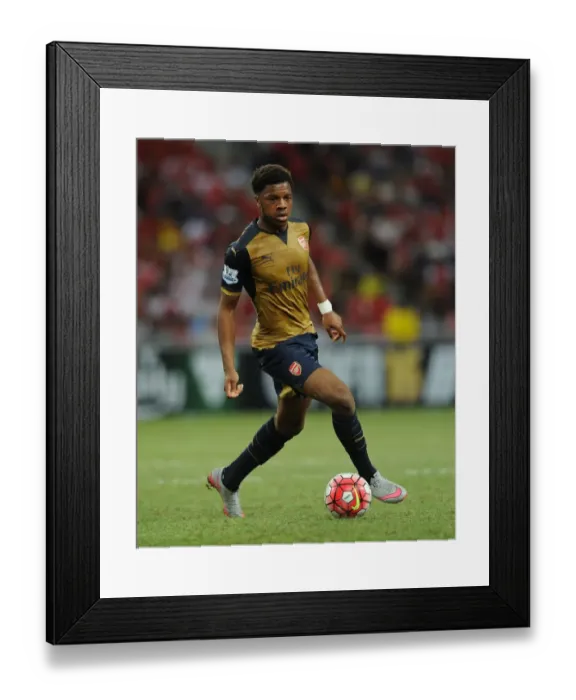 Framed Print : Arsenal's Chuba Akpom Shines in Action against Singapore XI at the Barclays Asia Trophy Framed Print : Arsenal's Chuba Akpom Shines in Action against Singapore XI at the Barclays Asia Trophy