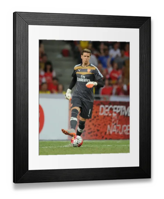 Framed Print : Arsenal's Wojciech Szczesny in Action against Singapore XI at the Singapore National Stadium (July 15, 2015) Framed Print : Arsenal's Wojciech Szczesny in Action against Singapore XI at the Singapore National Stadium (July 15, 2015)