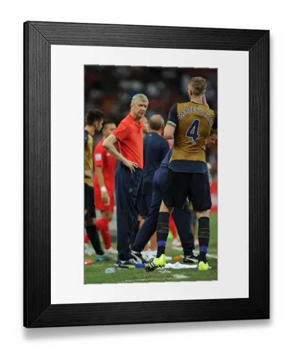Framed Print : Arsene Wenger and Per Mertesacker Lead Arsenal against Singapore XI in Barclays Asia Trophy Framed Print : Arsene Wenger and Per Mertesacker Lead Arsenal against Singapore XI in Barclays Asia Trophy