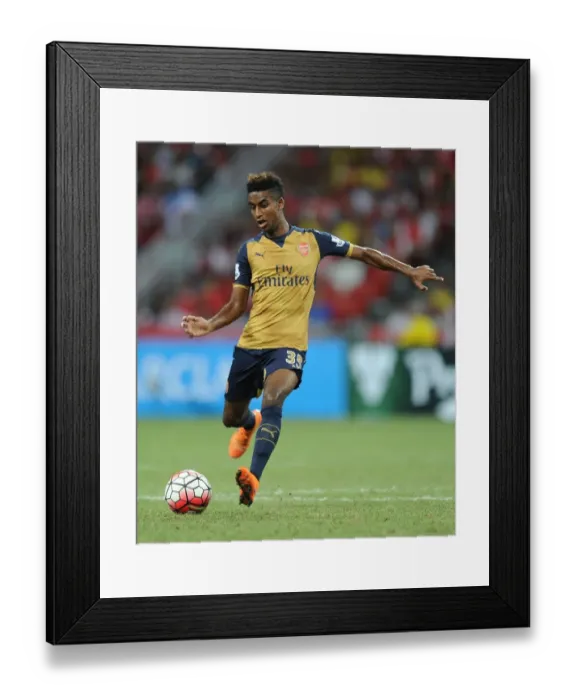 Framed Print : Arsenal's Gedion Zelalem in Action against Singapore XI during the Barclays Asia Trophy Framed Print : Arsenal's Gedion Zelalem in Action against Singapore XI during the Barclays Asia Trophy