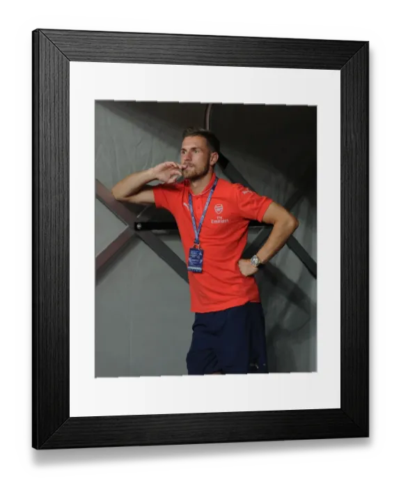 Framed Print : Arsenal's Aaron Ramsey Prepares for Arsenal v Singapore XI at Singapore National Stadium Framed Print : Arsenal's Aaron Ramsey Prepares for Arsenal v Singapore XI at Singapore National Stadium