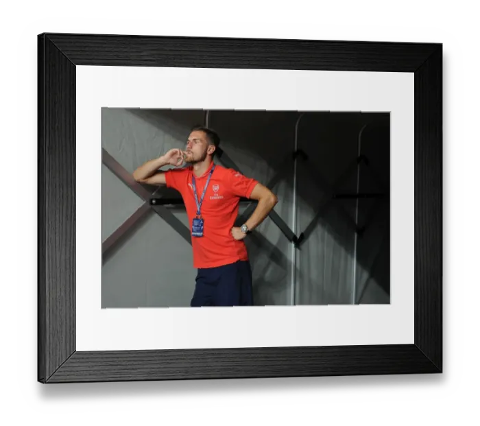 Framed Print : Arsenal's Aaron Ramsey Prepares for Arsenal v Singapore XI at Singapore National Stadium