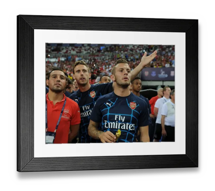 Framed Print : Arsenal's Triumvirate: Cazorla, Wilshere, and Monreal Align Before Arsenal v Singapore XI, 2015