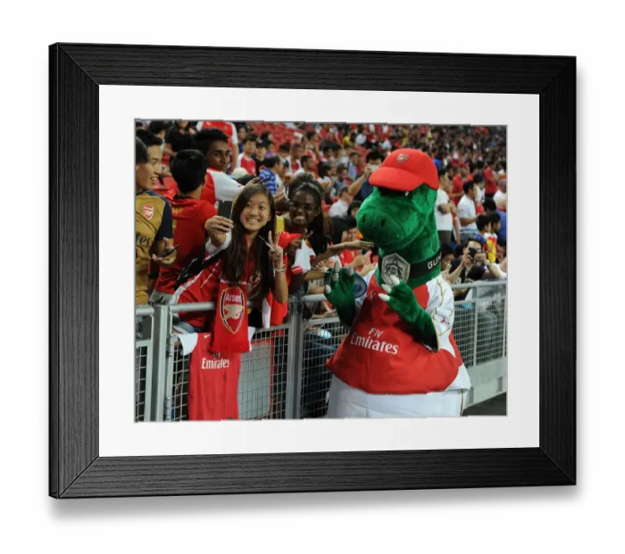 Framed Print : Arsenal Fans Reunite with Gunnersaurus before Arsenal vs. Singapore XI Match, 2015