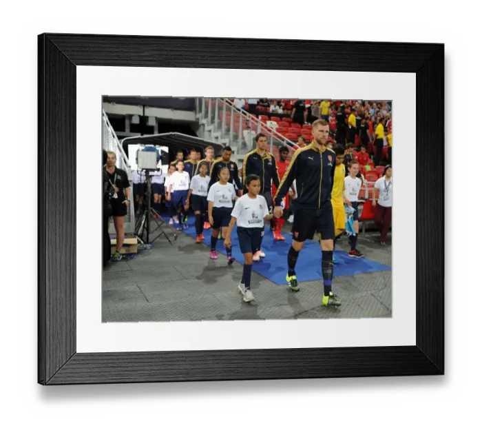 Framed Print : Arsenal's Per Mertesacker Leads Team Out in Arsenal v Singapore XI Match, Kallang, Singapore (July 15, 2015) Framed Print : Arsenal's Per Mertesacker Leads Team Out in Arsenal v Singapore XI Match, Kallang, Singapore (July 15, 2015)