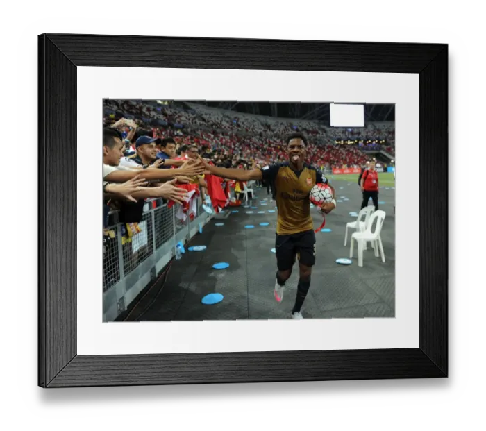 Framed Print : Chuba Akpom Scores and Celebrates with Arsenal Fans in Singapore