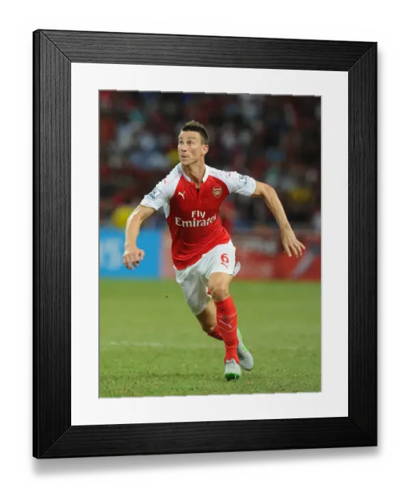 Framed Print : Arsenal's Laurent Koscielny in Action Against Everton at 2015 Asia Trophy, Singapore
