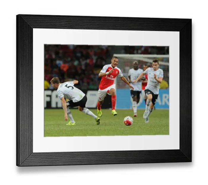 Framed Print : Arsenal's Kieran Gibbs Outsmarts Everton's Stones and Coleman in Barclays Asia Trophy Match
