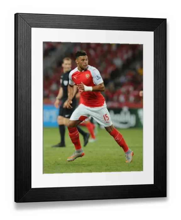 Framed Print : Arsenal's Oxlade-Chamberlain in Action Against Everton at 2015 Asia Trophy in Singapore