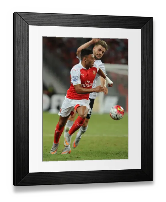 Framed Print : Arsenal's Oxlade-Chamberlain Outwits Garbutt in Barclays Asia Trophy Clash